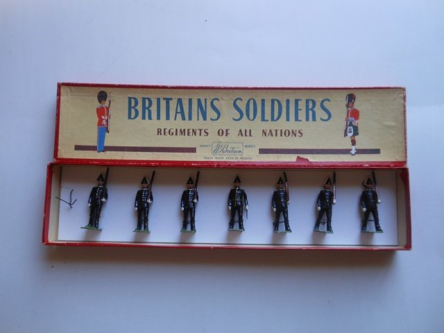 Britains Set #2035 Swedish Life Guards: Post War. 7 pieces tied in original R.O.A.N. box. Condition very good. Box very good.