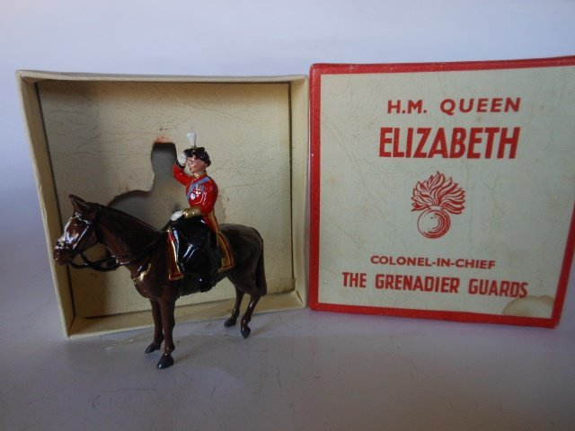 Britains Set #2065 H.M the Queen: Post War. One piece. Trooping the Colour in original box. Condition excellent. Box very good.