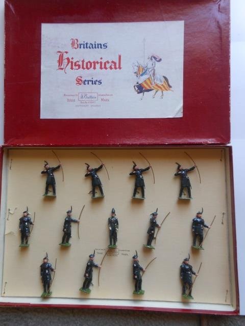 Britains Set #2089 Royal Company of Archers: Post War. 13 pieces tied in original historical box. Condition very good. Box very good.
