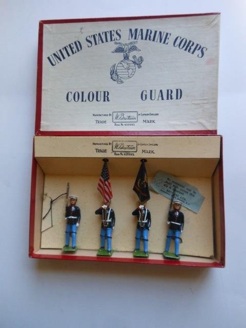 Britains Set #2101 US Marine Corps Color Guard: Post War. 4 pieces tied in original US Marine illustrated box. Condition very good. Box very good.