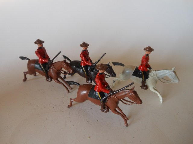 Britains from Set #1349 Royal Canadian Mounted: Police. 4 pieces. Post War. Unboxed. Condition very good.