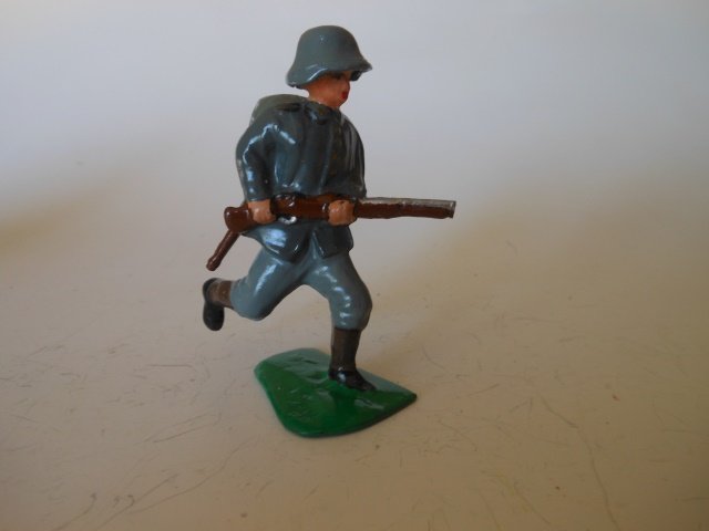 Lou Steinberg's Unique Dimestore Creations: German advancing full backpack, water, & grenade.