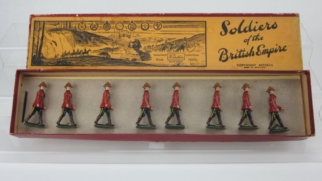 Britains Set #1554 Royal Canadian Mounted Police: Post War. 8 Pieces. Re-tied in Soldiers of British Empire box. Condition Excellent; Replaced tie card.