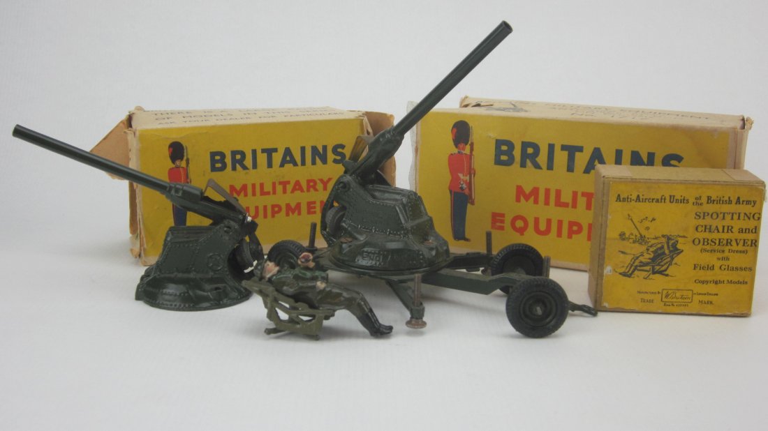 Britains Sets #1715, #1717 and #1731: Anti- Aircraft Guns and Spotting Chair with Observer. Post War. 4 Pieces. Illustrated boxes in Poor Condition. Condition Very Good.