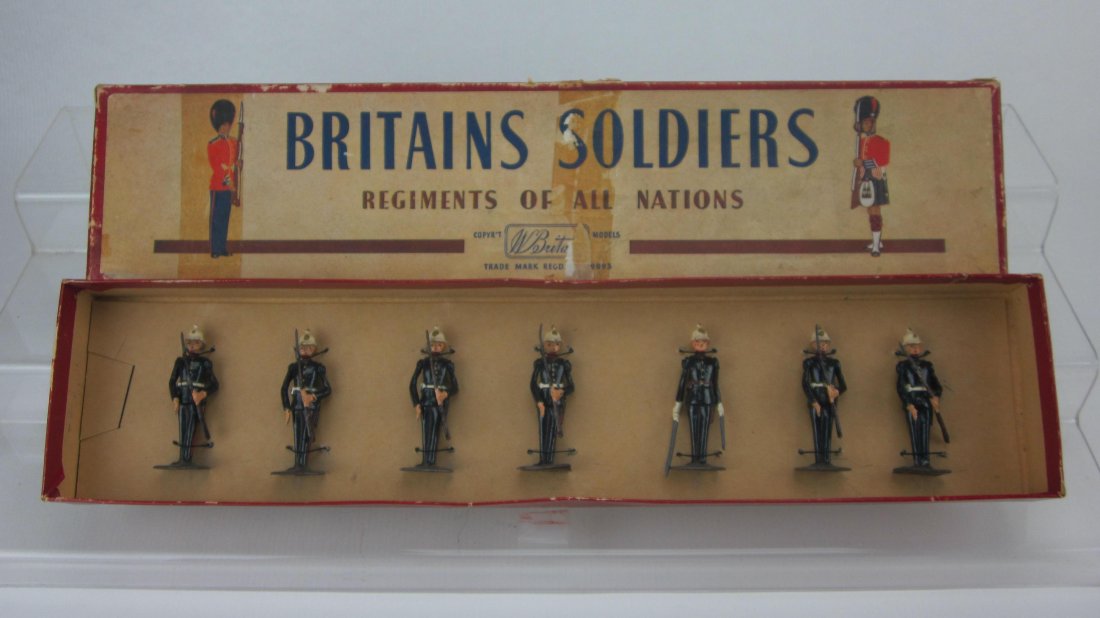 Britains Set #2071 Royal Marines at Present Arms: Post War. 7 Pieces. Re-tied in ROAN box. Condition Excellent; With replaced tie card.