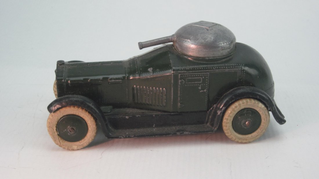 Britains Set #1321 Armored Car: Pre War. Dark green over black fenders and white treaded tires. No box. 1 Piece. Condition Very Good.