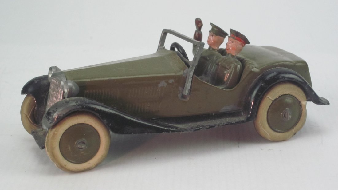 Britains Set #1448 Staff Car: Pre War. Open windshield, driver's arm raised and khaki over black fenders. No box. 1 Piece. Condition Very Good; Right side tires starting to flatten.