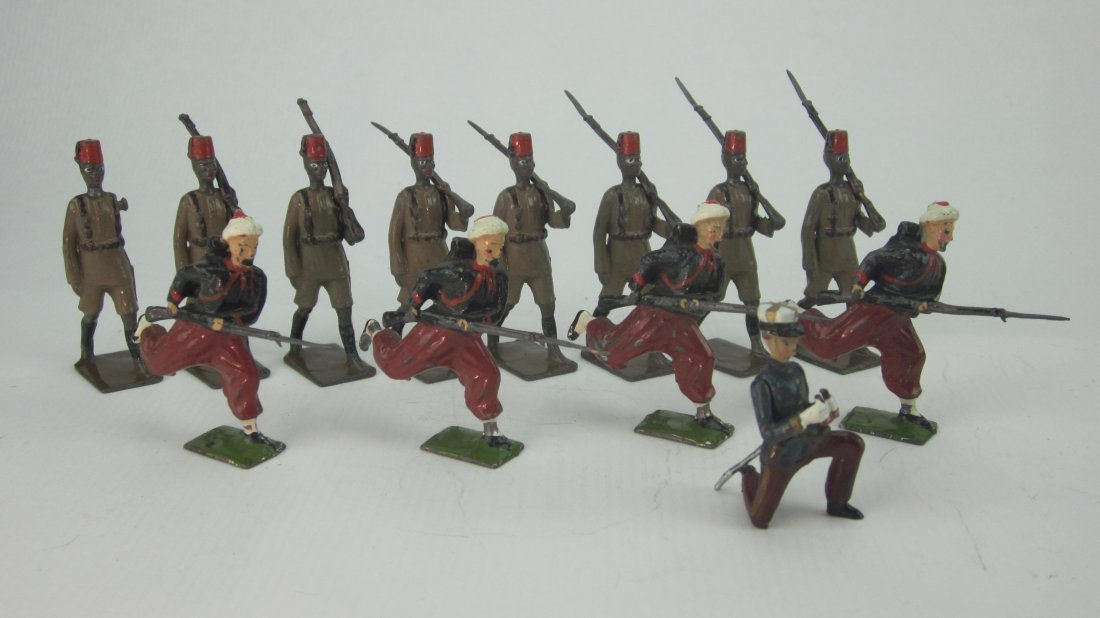 Britains Set #142, #225 and #2095: French Foreign Legion Officer, 4 Zouaves and 8 King's African Rifles. No box. 13 Pieces. Condition Good; 2 bayonets and 1 rifle arm gone.