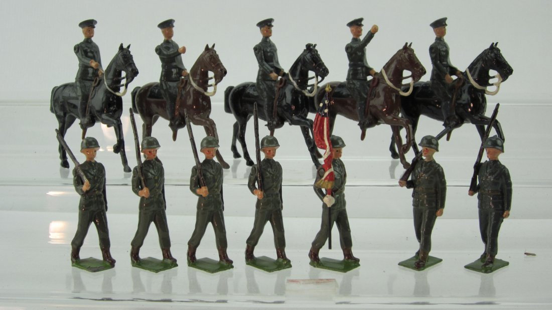 Britains Set #267 U. S. Infantry at Slope: Post War. With Cavalry at Walk. No box. 12 Pieces including flagman. Condition Excellent; 2 men mismatch.