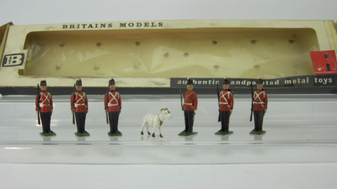Britains Set #9158 Fort Henry Guard with Goat: Post War. In tattered Cello Front box. 7 Pieces. Condition Excellent; Cello detached and both end flaps missing tab.