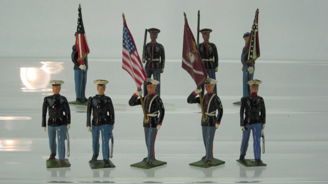 Britains from Sets #229, #2101, #2059 and #2060: Pre and Post War U. S. Assortment. No box. 9 Pieces; Including 4 Flagmen. Condition Excellent; 1 rifle tip gone.