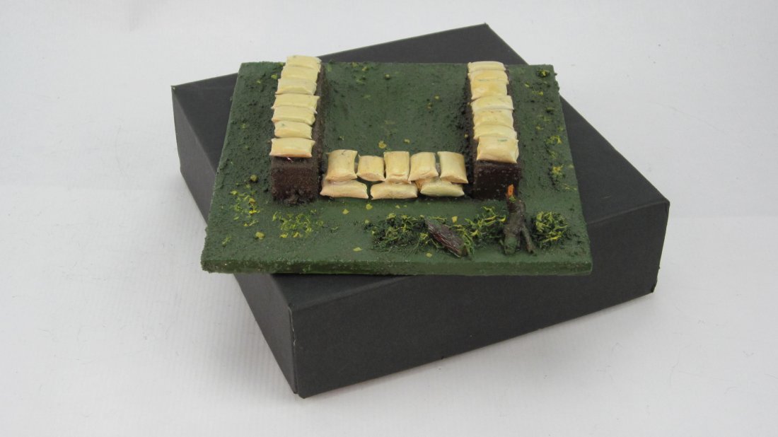 The Army Supply Company Copy of Britains Set #1746: Sandbagged Machine Gun Emplacement. Circa 1990. 6 Inch by 6 Inch base. In Original box. 1 Piece. Condition Near Mint.