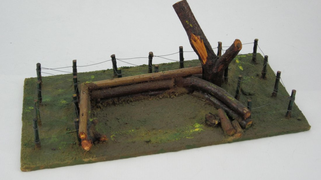 The Army Supply Company Log Gun Emplacement: With Barb Wire. Circa 1990. No box. 1 Piece. Condition Near Mint.