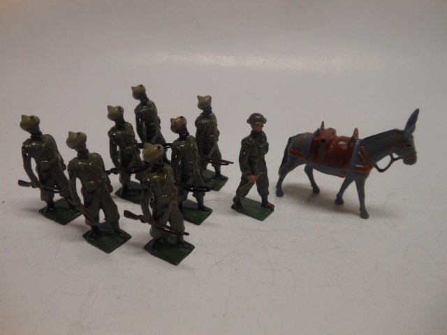 Britains from Set 1893 Indian Army Service Corps: 9 pieces, including officer, men and mule. Post War. Unboxed. Condition excellent.