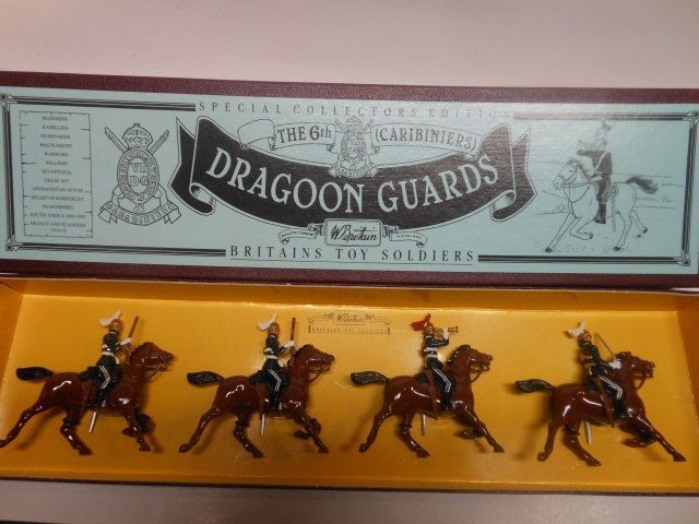 Britains set #8828 Sixth Caribiniers: 4 pieces. Post War. Tied in original illustrated box. Condition excellent. Box excellent.