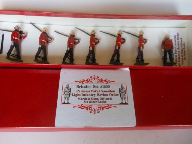 Britains from set #1633 Princess Patricia's: Light Infantry. 7 pieces. Post War. In a plain red box. Condition excellent. Box very good.