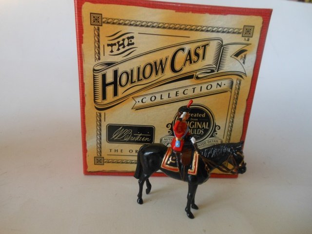 Britains set 40197 H.M. the Queen riding Burmese: New Hollow Cast. One piece. Post War. With original box. Condition very good. Box very good.