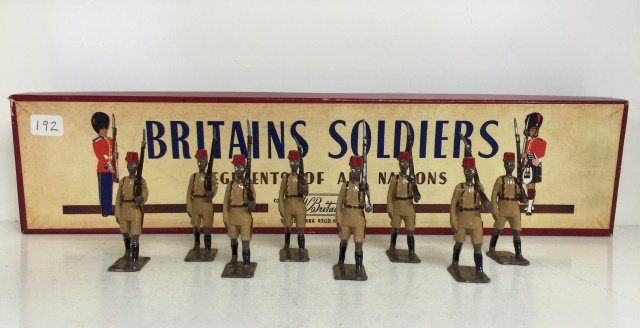 Britains Set #225 King's African Rifles: Post War. In original ROAN Box. 8 Pieces. Condition Figures Near Mint. Condition Box Excellent.