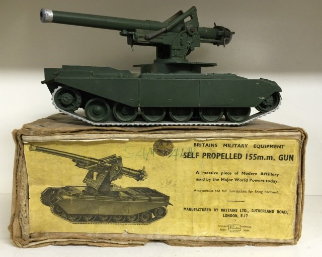 Britains Set #2175 Self Propelled 155mm Gun: Post War. In original Corrugated Box. 1 Piece. Condition Figure Very Good. Condition Box Very Good; No shells.