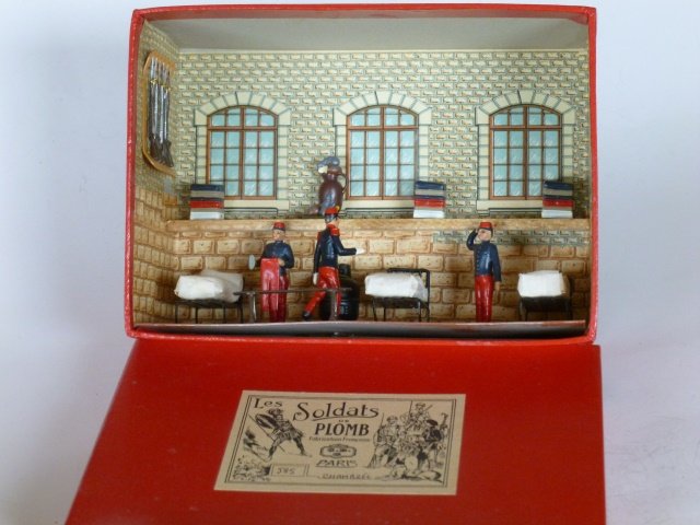 Mignot Chambree: Soldiers' Barracks. 12 pieces Glued in place in original box. Post War. Condition excellent. Box excellent.