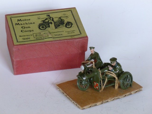 Britains set #1793 Machine Gun Corps: Soldier on motorcycle plus soldier riding in side car with gun. Post War. In original Illustrated box. Condition excellent. Box very good.