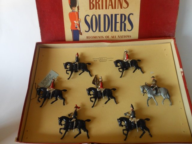 Britains set #2067 Sovereign's Escort: 7 mounted pieces. Tied in original R.O.A.N. box. Post War. Condition excellent. Box very good.