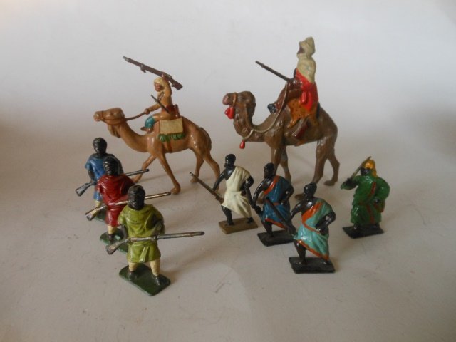 Britains, Hill, Crescent Arabs and Tribesmen: 9 pieces, including an Arab on Camel; and Johillco Ethiopian Tribesman. Pre-War and Post War. Unboxed. Condition very good.