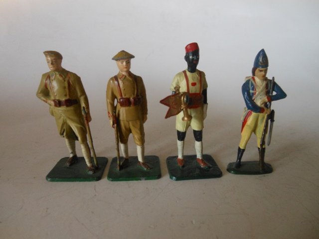 Minikin assortment: 4 pieces, including King's African Rifle Bugler and Chinese Nationalist Troop. Post War. Unboxed. Condition excellent.