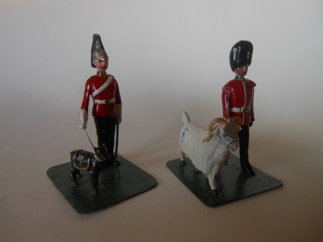 Regimental Mascots: A Dragoon Handler with Dog Mascot; and Royal Welch Fusilier Handler with Ram Mascot. Post War. Unboxed. Condition excellent.