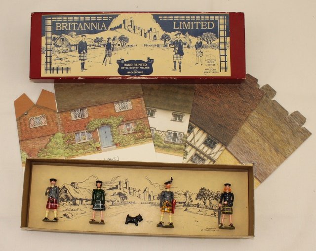 Britannia Limited Scottish Civilians: 5 pieces including Scotty dog, new condition in good condition illustrated box along with 4 Ian Logan Cottages on cardstock to be assembled, also in excellent condition