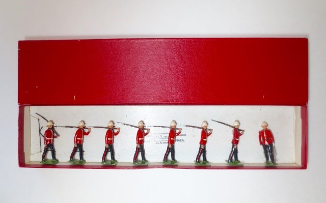 Britains Set #1633 Princess Patricia's Canadian: Light Infantry. 8 pieces. Post War. Tied on original card in red craft box.