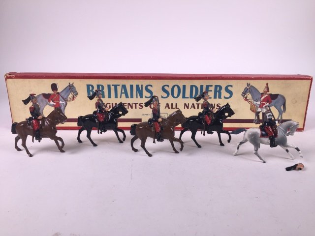 Britains Set #138 Cuirassiers: Post War. In original ROAN box. 5 Pieces. Condition Figures Very Good; Officer's head repaired. Condition Box Excellent.