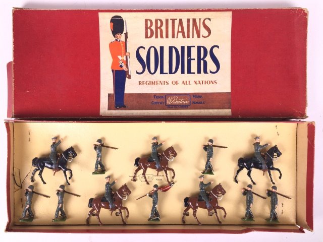 Britains Set #267 U. S. Infantry and Cavalry: Post War. Originally tied in original ROAN box. 12 Pieces. Condition Figures Near Mint. Condition Box Very Good; With edge splits.
