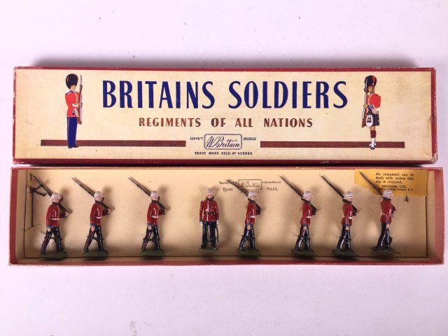 Britains Set #1633 Princess Patricias Canadian: Light Infantry. Post War. Originally tied in original ROAN box. 8 Pieces. Condition Figures Pristine. Condition Box Excellent.