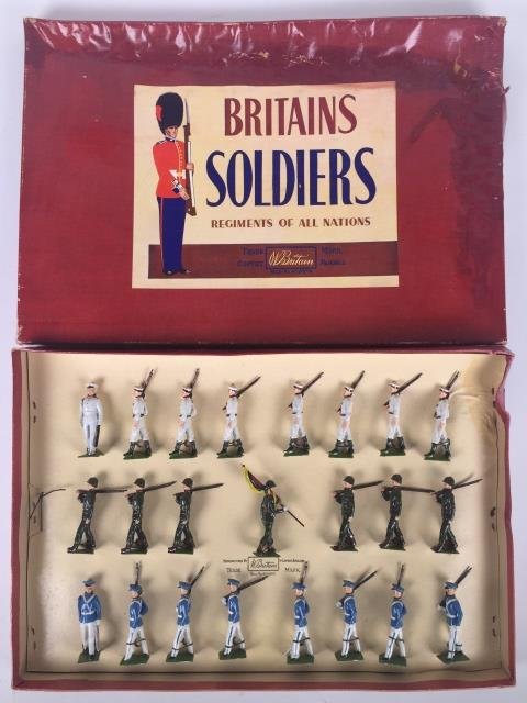 Britains Set #2100 Venezuelan Military Display: Post War. Originally tied in original ROAN box. 23 Pieces. Condition Figures Pristine. Condition Box Good; With water damage.