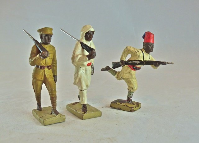 Lineol 3 Ethiopian War Soldier+Native+Askari: Soldier with rifle has thin base and arm crack with hardly any wear. Native in white with rifle has a leg crack and hardly any wear. Askari soldier has a boot crack and just some light wear mostly to