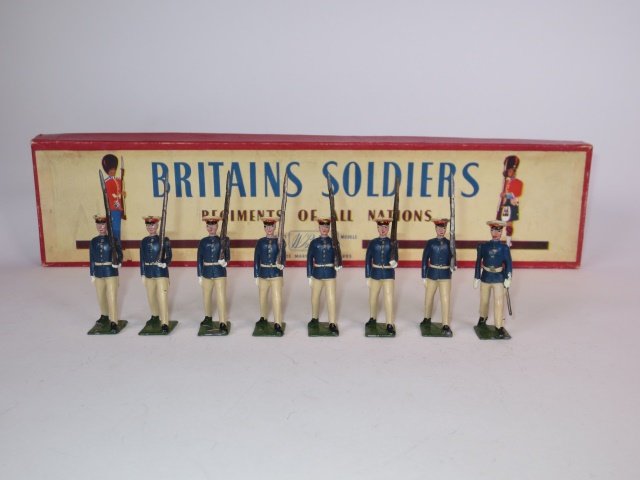 Britains Set #1836 Argentine Military Cadet: Post War, in original ROAN box with tie card. 8 Pieces. Condition Excellent, Box Very Good, end label replaced.