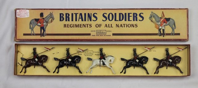 Britains Set #66 13th Lancers: The 13th Duke of Connaught's Own Lancers. Late 1940's production with Green tunics. 5 pieces. Condition: figures mint tied-in-box, Box excellent.