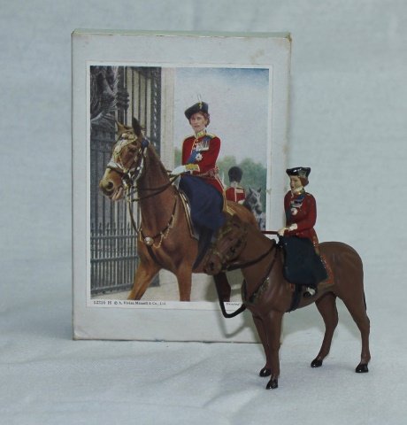 Timpo Queen Elizabeth II: Queen Elizabeth II on Horseback. Post War. 2 pieces. In illustrated box. Condition: figure excellent in excellent box.