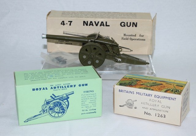 LOT Britains Artillery Pieces: Includes #1201 Royal Artillery Gun, #1264 4.7 inch Naval Gun, #1263 Gun of the Royal Artillery. Post War. 3 pieces. Condition: #1201 and #1263 mint-in-box, Boxes excellent. #1264 Naval Gun in excellen