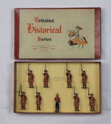 Britains Set #1257 Yeomen of the Guard: Yeomen of the Guard. Post War 1952-62. 9 pieces. Condition: figures mint tied-in-box, Box very good to excellent. One corner split.