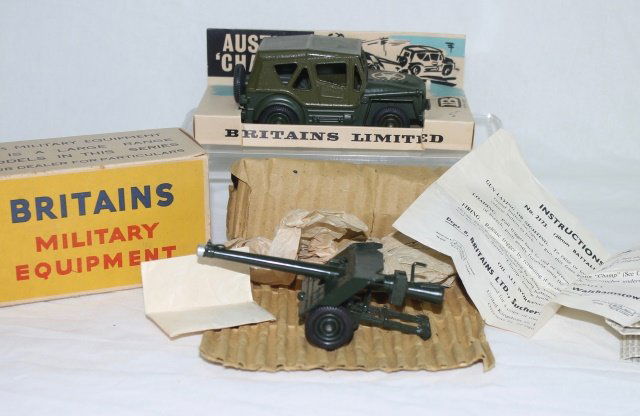 LOT Britains Austin Champ and Gun: Includes Set #2173 BAT Gun and Set #9740 Austin Champ. Post War 1960-66. 2 pieces. Condition: Excellent, hood decal on Champ degraded. Boxes Very Good.