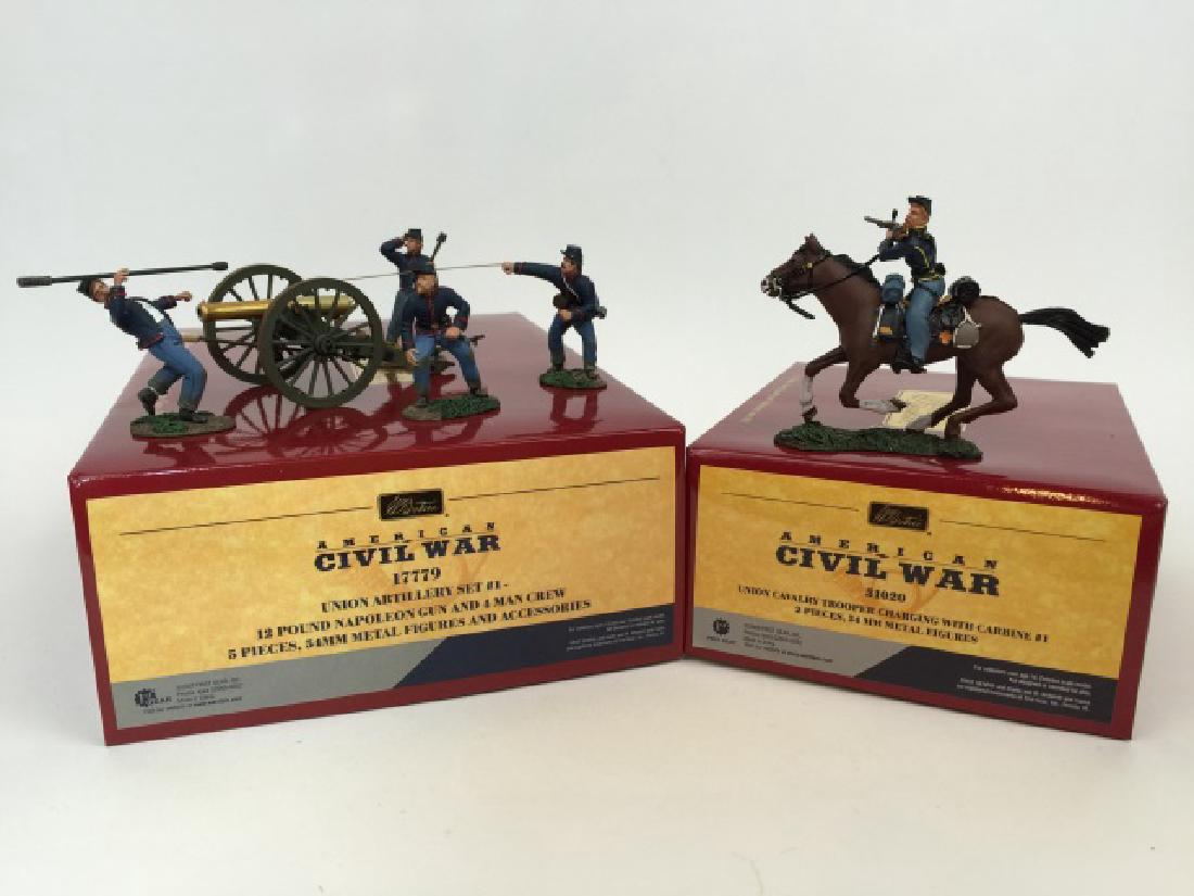 W Britain Set #17779 & #31020 Union Artillery: Includes Set #17779 Union Artillery Set #1 - 12 Pound Napoleonic Gun and 4 Man Crew and Set #31020 Union Cavalry Trooper Charging with Carbine #1. 54mm Figures. 6 pieces. Condition figures near mint. 