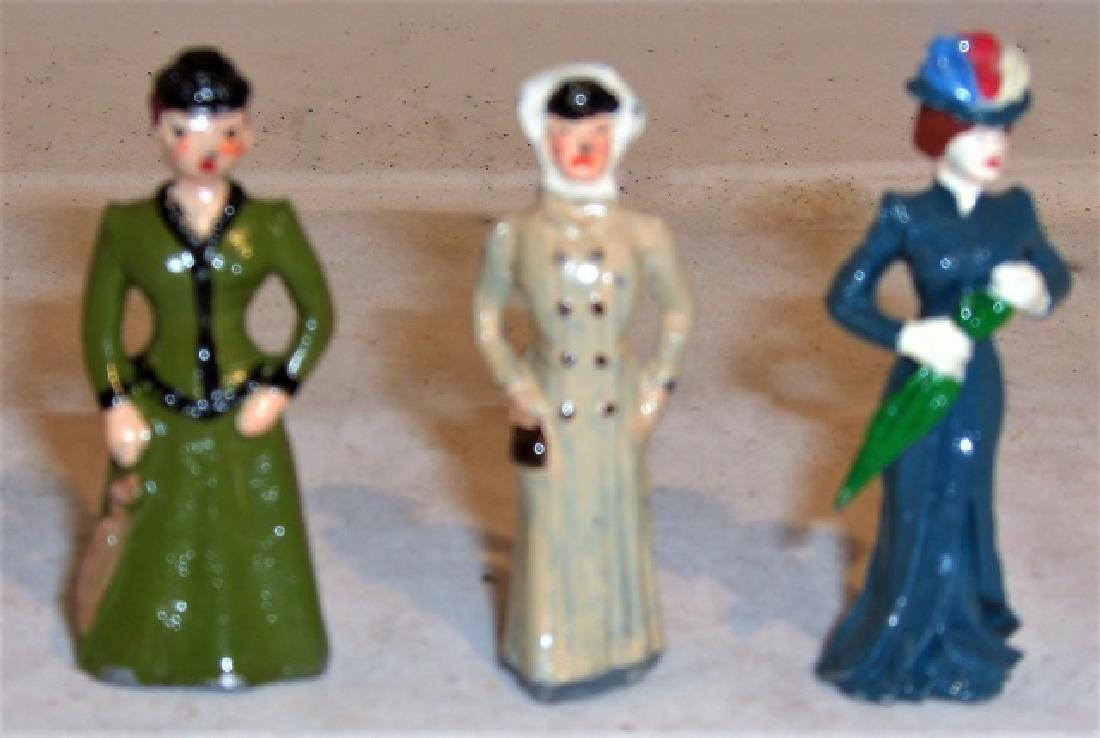 3 54mm Solidcast Ladies: no manufacturer's marks; excellent condition