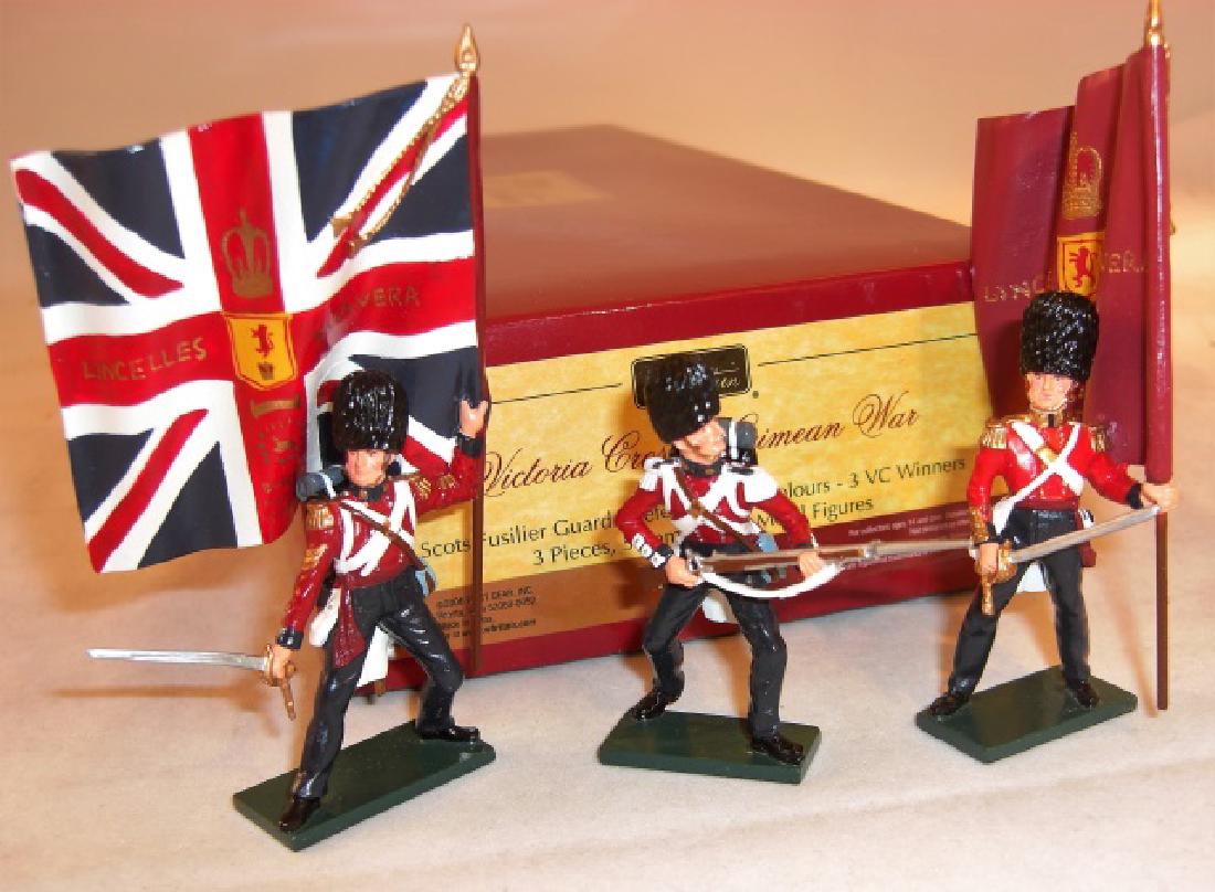 Britains Victoria Cross Crimean War: #43072 Scots Fusiliers Guards Defending The Colours; 3 VC winners; 3 figures - maroon flagbearer unbalanced, difficult to stand on flat surface; excellent in excellent box