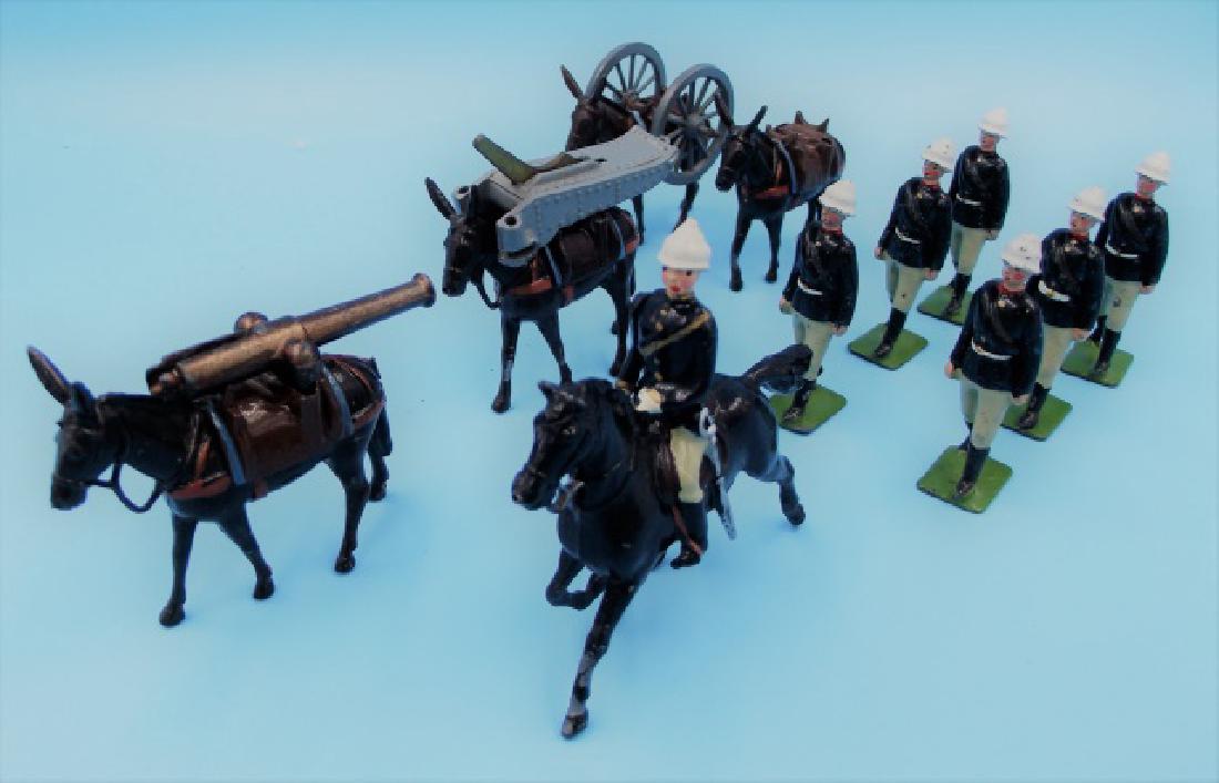 Britains Mountain Gun of Royal Artillery No. 28: Post War, 11 figures, plus artillery piece. Figures very good to excellent . The box is sturdy, but poor condition.