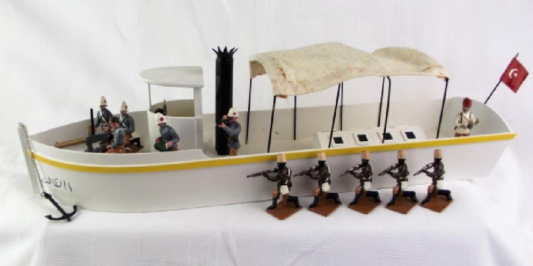 Trophy Nile Gun Boat: 11 figures included in this iconic set by Trophy of Wales. There is a slight yellowing of the fabric canopy, otherwise everything else is excellent.