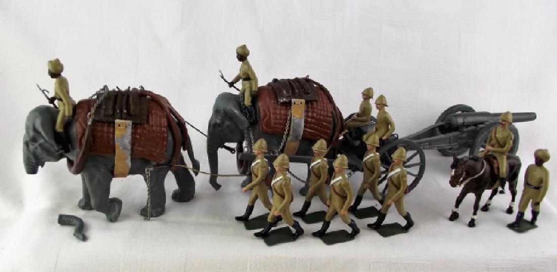 Elephant Gun Team at the Walk: Unknown maker, boxed. Fair to good condition. This set needs some touch up and repairs, overall impressive set. 13 pieces.