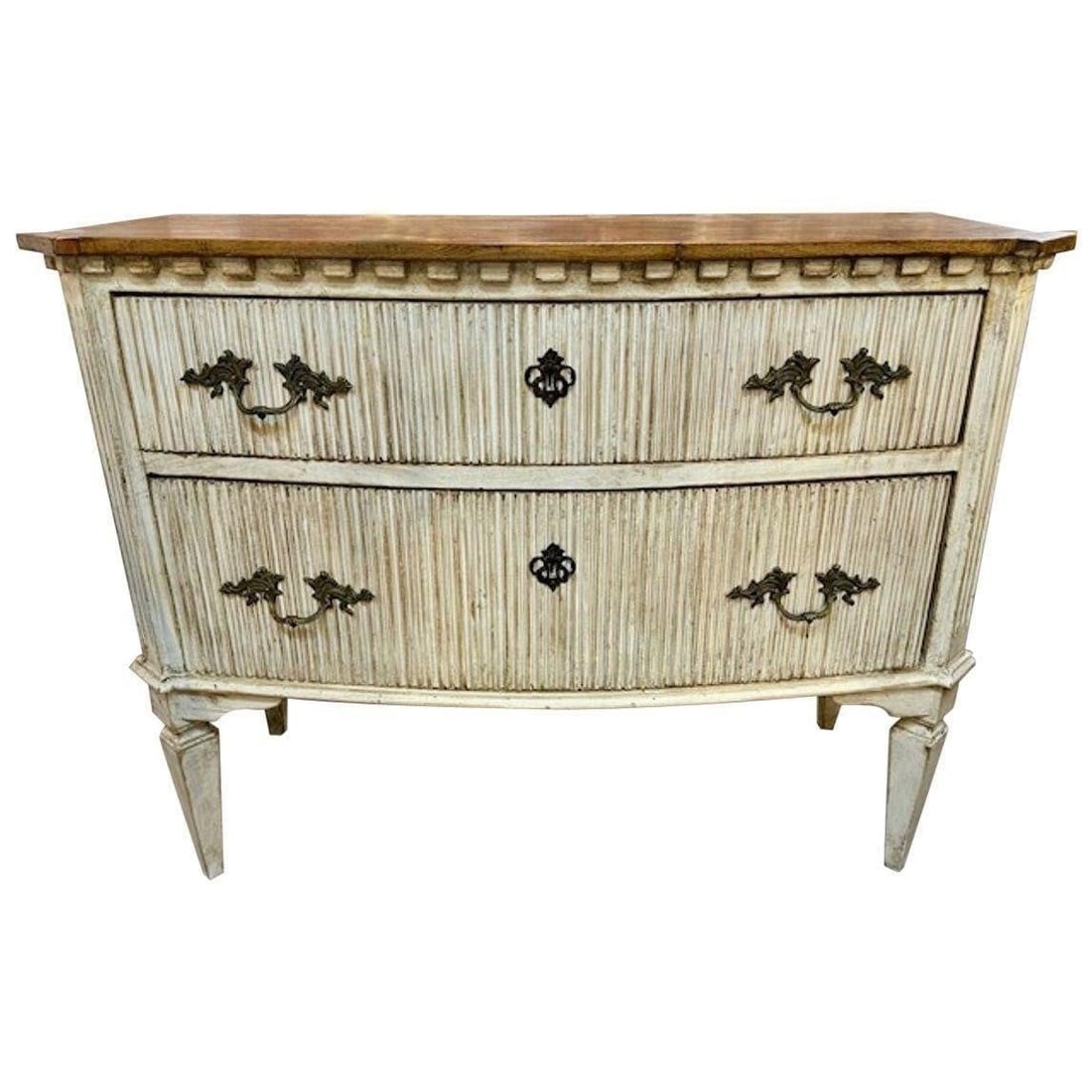 Italian Carved and Painted Commode: This lot is located in Dallas, TX Italian Carved and Painted Commode. Fluted and shaped front drawers. Distressed cream paint with walnut finish top.46.5W x 21D x 36H. May have age appropriate wear wi