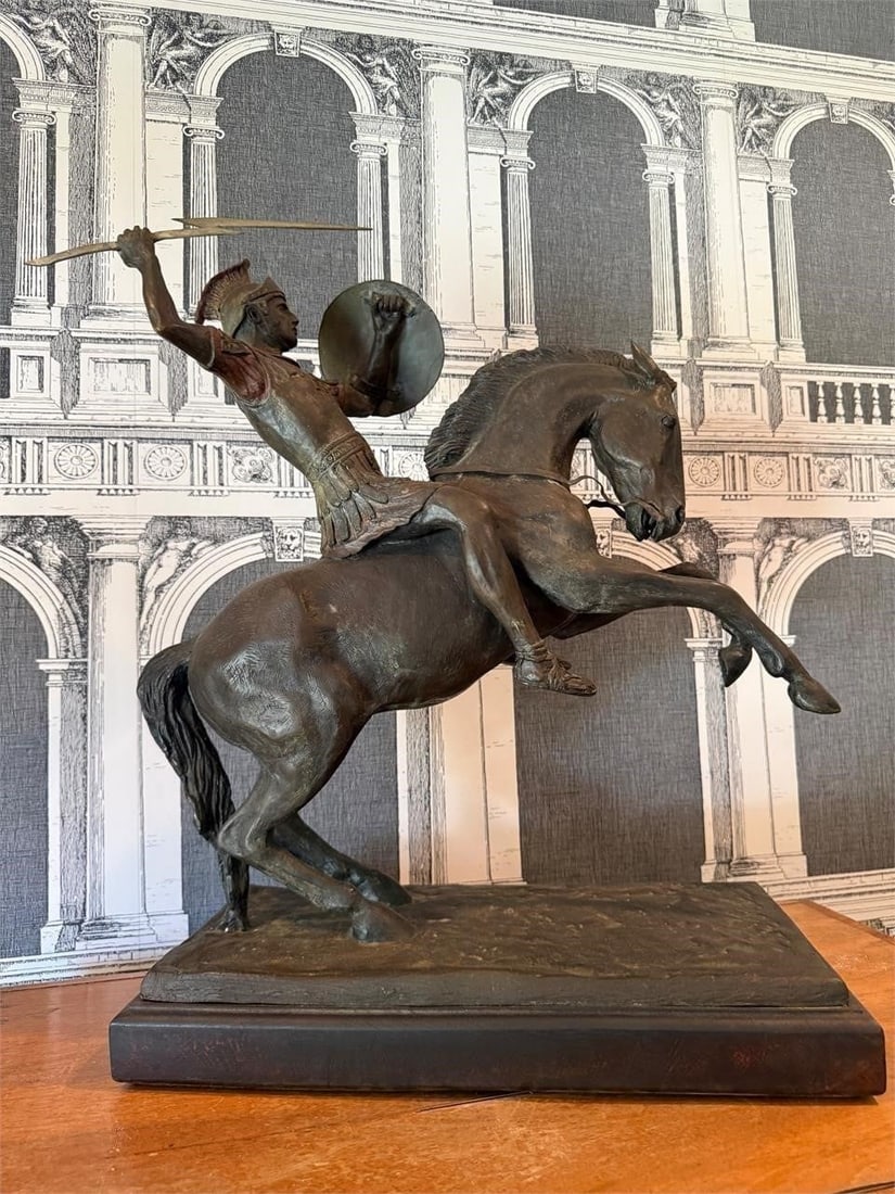 Grand Tour Bronze of Greek Warrior on Horse: Large Grand Tour Bronze, late 19th century patinated sculpture depicting a Greek warrior on a rearing horse, raised on a rectangular base. Classical inspired figure.Good overall condition with minor w